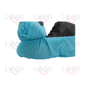 El cubre zapatos desechable azul claro